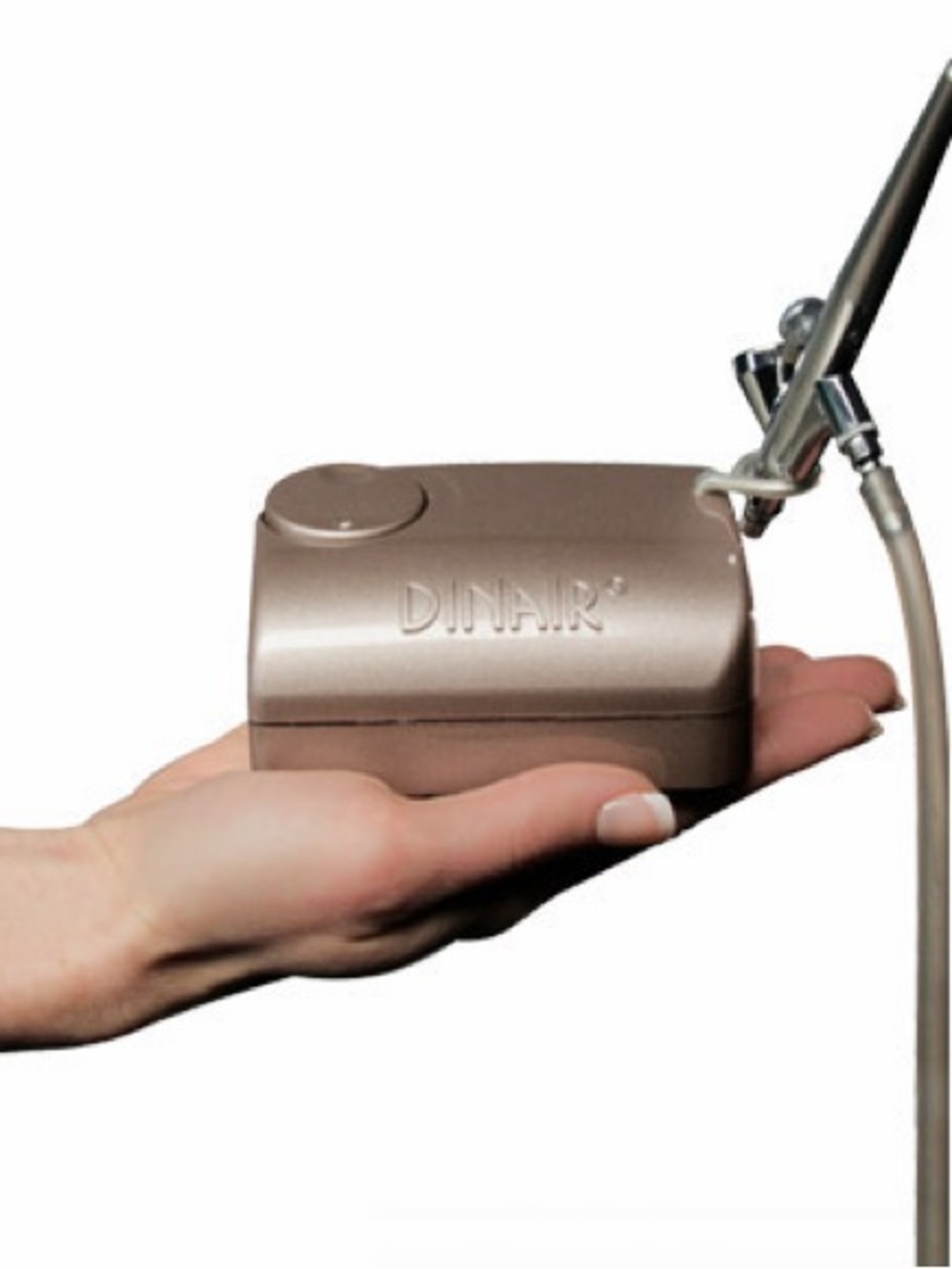 Dinair Airbrush compressor in champagne and gun